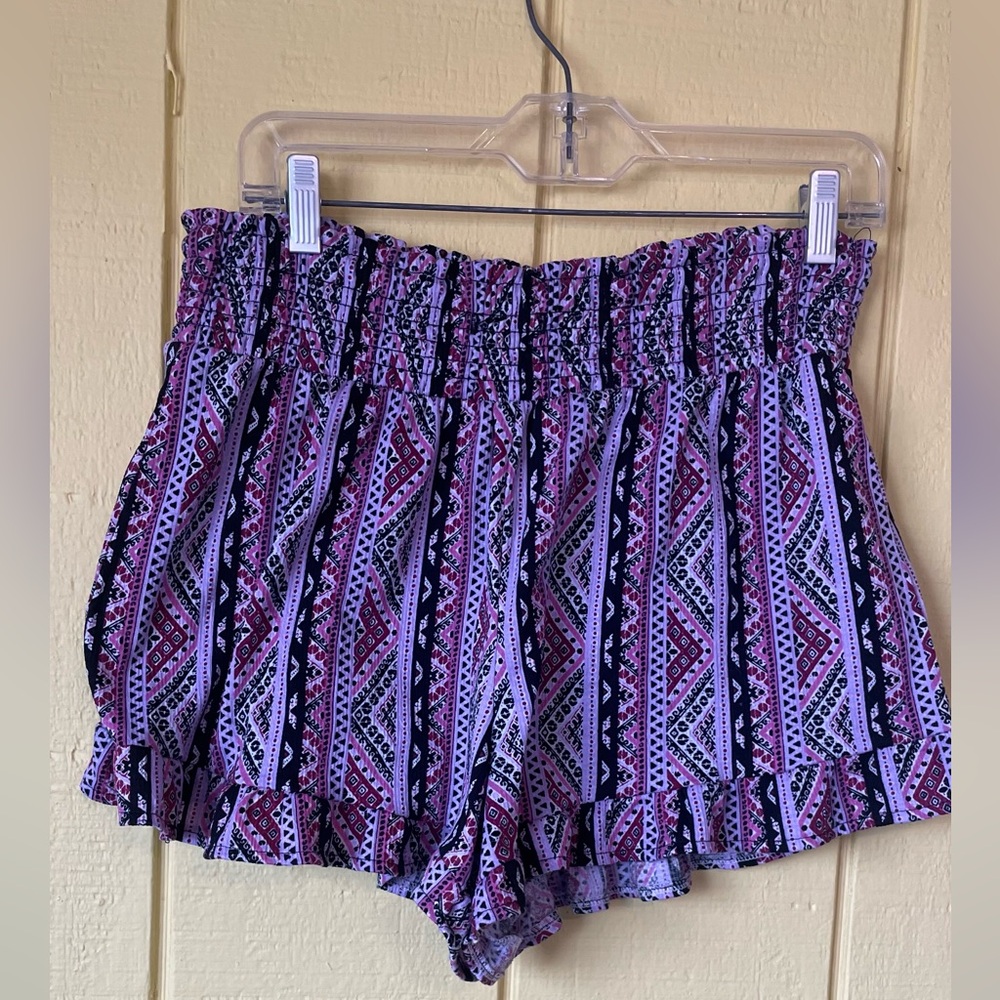 XL- No Boundaries High Waist Purple Hue Patterned with Black Shorts and ruffles.